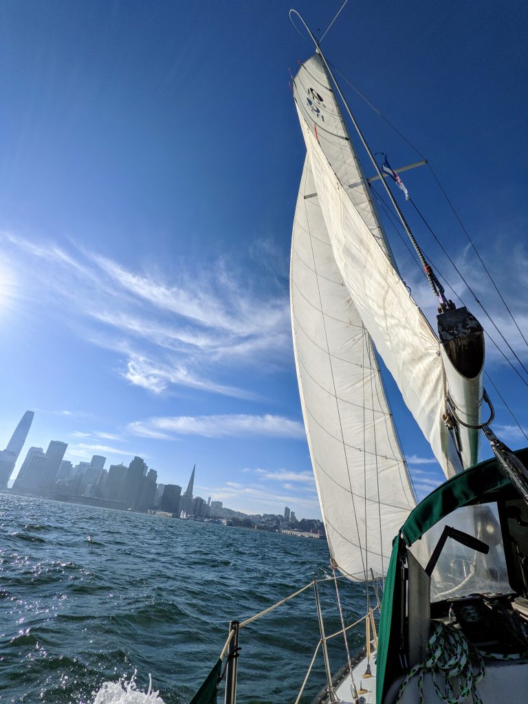 Sailboat with city in the background